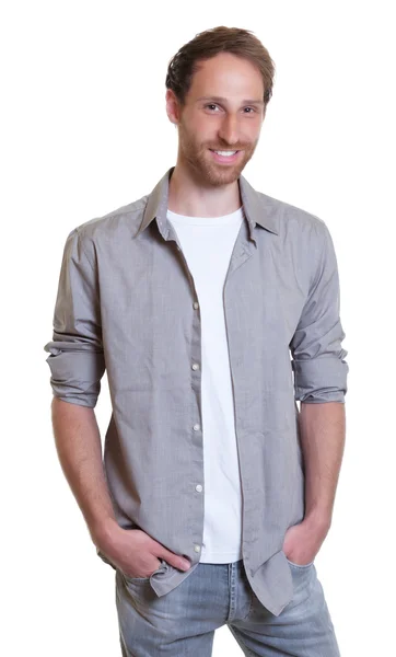 Hombre alemán de pie con barba y jeans — Foto de Stock