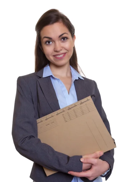 Aantrekkelijke zakenvrouw met bruin haar en bestand — Stockfoto