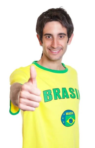 Brazilian man with short black hair showing fist — Stockfoto