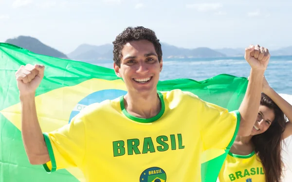 Fani sportu brazylijski z jersey i flaga — Zdjęcie stockowe