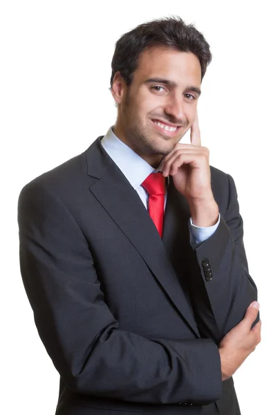Pensando hombre de negocios hispano con traje — Foto de Stock