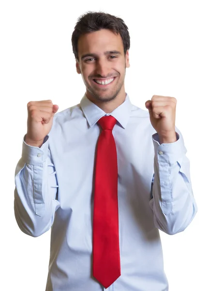 Empresário aplaudindo com gravata vermelha — Fotografia de Stock