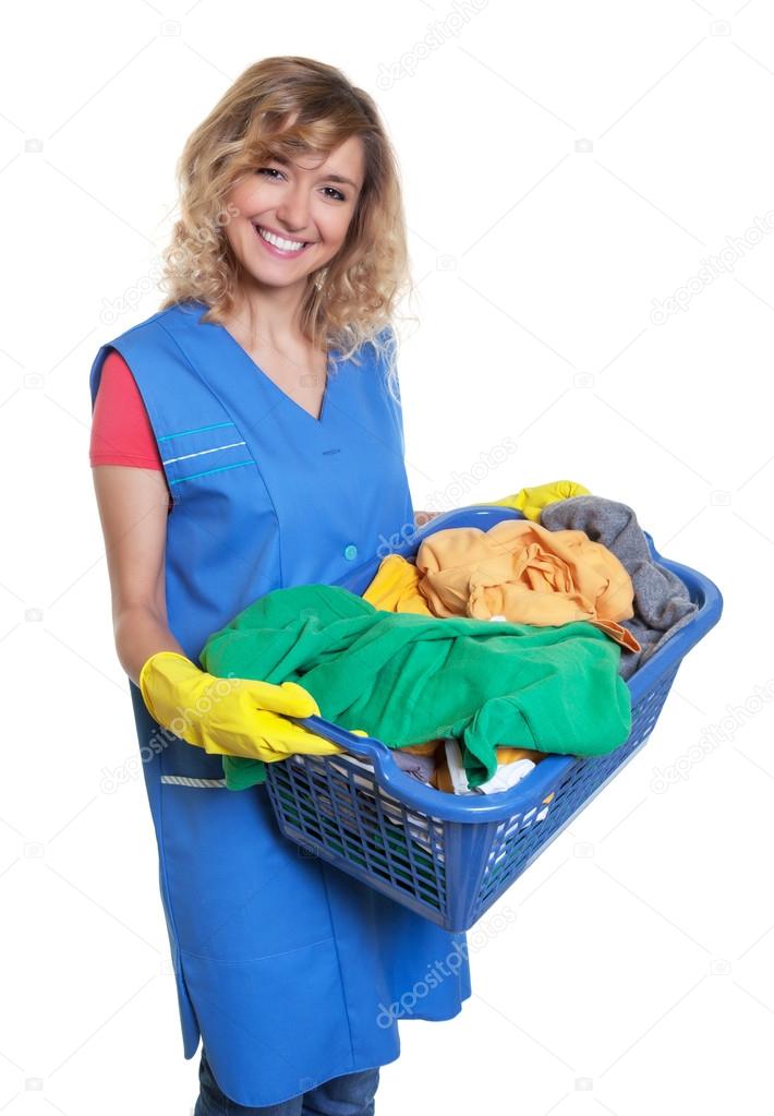 Beautiful blonde housewife with dirty clothes