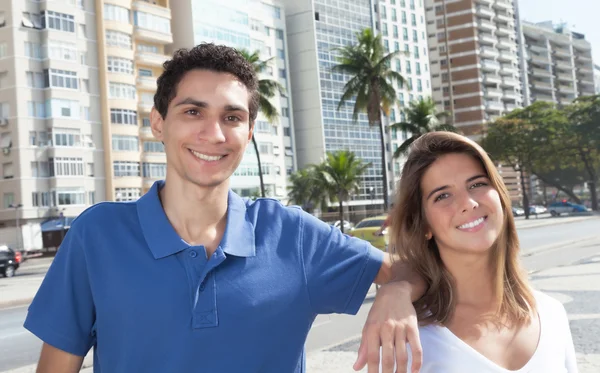 Laughing mexican guy with girlfriend in the city — Stock Photo, Image