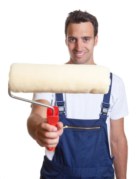 Painter with painting roller at work — Stock Photo, Image
