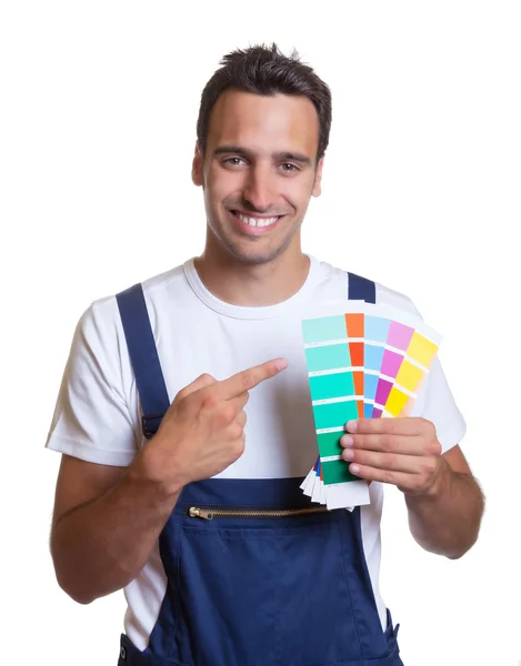 Happy painter showing colors Royalty Free Stock Photos