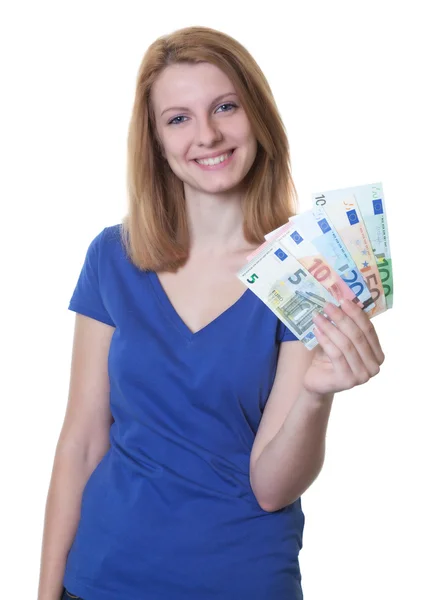 Young woman with red hair showing money — Stock Photo, Image