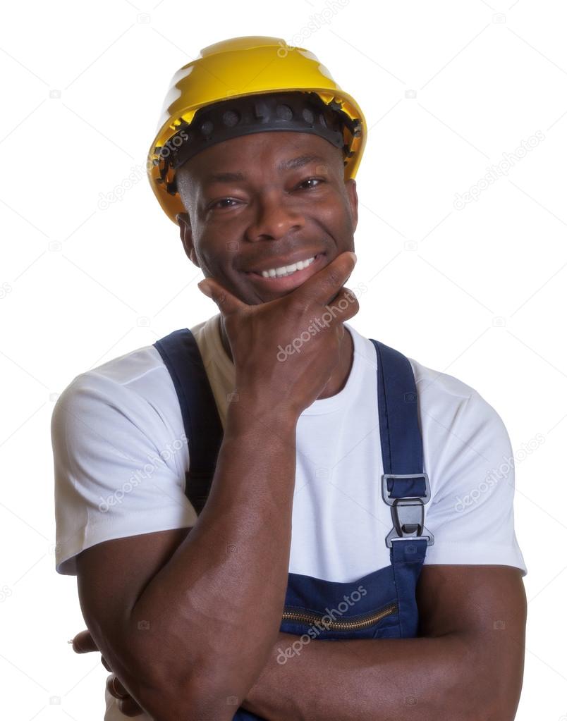 African construction worker looking at camera