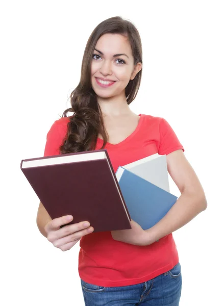 Female student with long dark hair showing a book — Stock Photo, Image