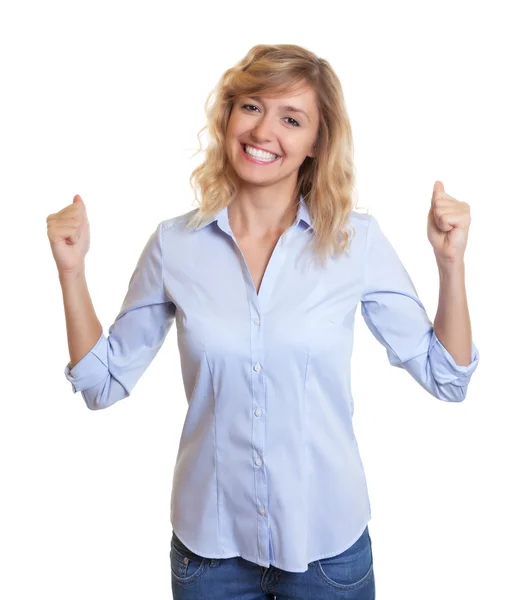 Cheering blond woman with jeans — Stock Photo, Image