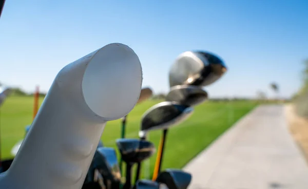 Achtergrond Afbeelding Van Meerdere Golfstokken Achterkant Van Een Golfkar — Stockfoto