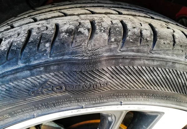 a bump on the tire, damage on the wheel