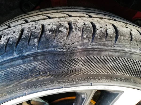 a bump on the tire, damage on the wheel