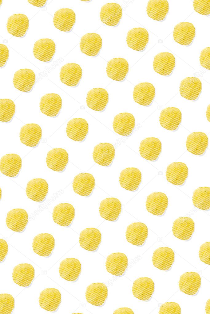 background made from Potato chips on white background flat lay. potato snack chips isolated Fast food banner.