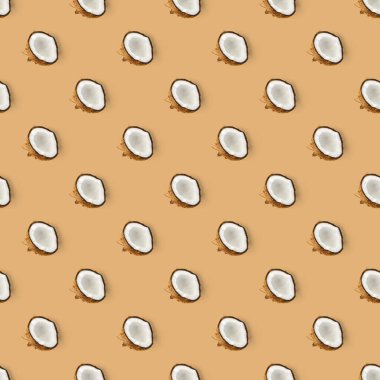 Hindistan cevizi aralıksız desen. Kahverengi arka planda izole edilmiş hindistan cevizi olan tropik soyut bir arka plan. düz yat.