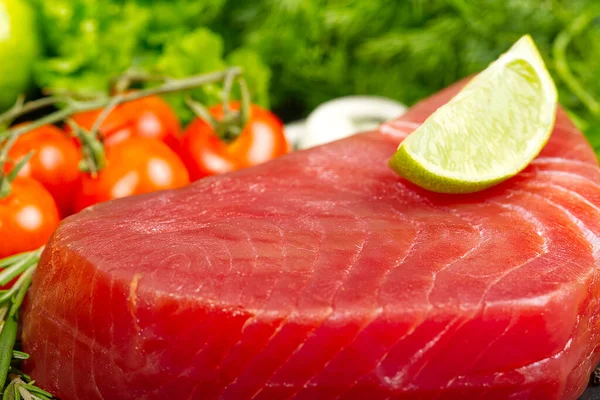 fresh yellowfin sliced tuna steak texture. bluefin tuna medallions with lime