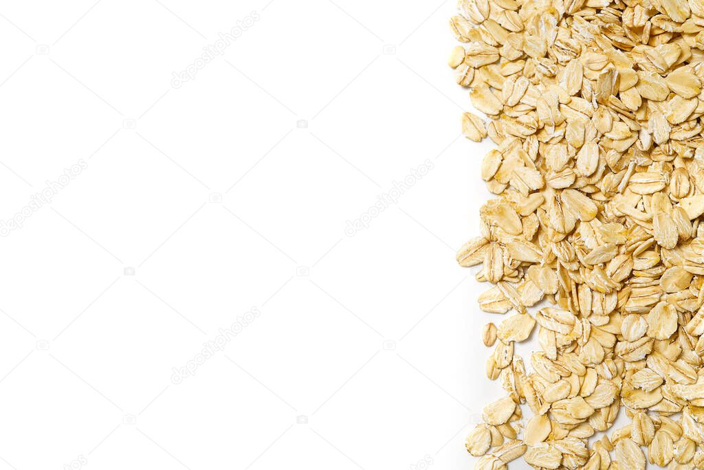 the oat flakes on a white isolated background copy space