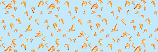 Tiger shrimp. Seafood background made from Prawns isolated on a blue backdrop. modern background from boiled shrimps, Seafood. not seamless pattern