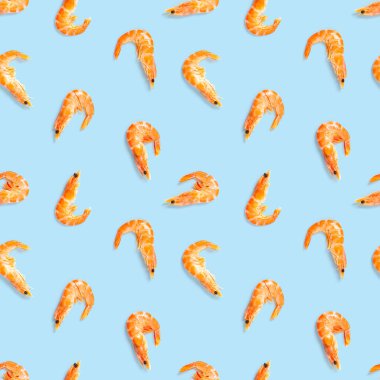 Kaplan karidesi. Karidesten yapılmış kusursuz desen mavi bir arka planda izole edilmiş. Karidesli deniz ürünleri deseni. deniz ürünleri deseni