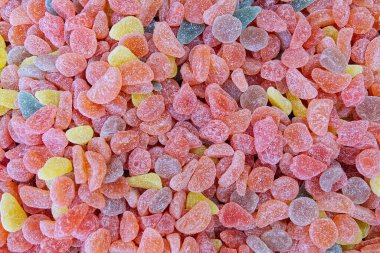 Şekercideki renkli şekerler. Şekerci dükkanının tatlı reçeli detayından yapılmış renkli arka plan