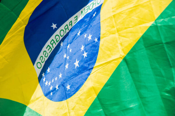 Brazil flag upside down outdoors in Rio de Janeiro Brazil.
