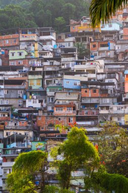 Favela da Rocinha in Rio de Janeiro, Brazil - August 26, 2021: Favela da Rocinha, seen from the neighborhood of Gavea in Rio de Janeiro. clipart