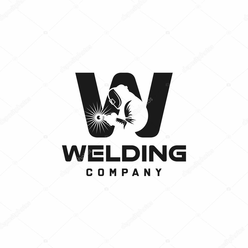 Letter W welding logo, welder silhouette working with weld helmet in simple and modern design style