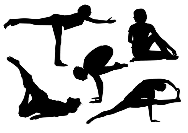 Siluetas de yoga — Vector de stock