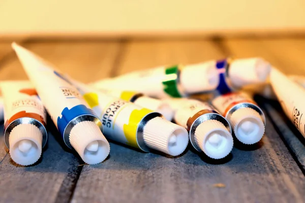 Tubes Paint Table Gray Wooden Background — Stock Photo, Image