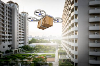 İHA şehirde bir teslimat kutusuyla uçuyor.