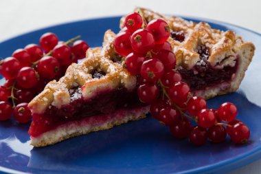 cherry pie on blue plate