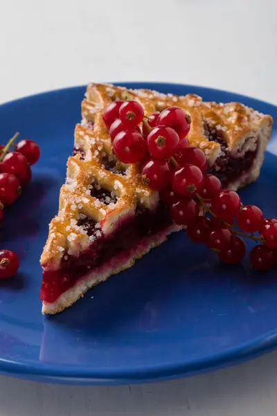 Cherry pie on blue plate — Stock Fotó