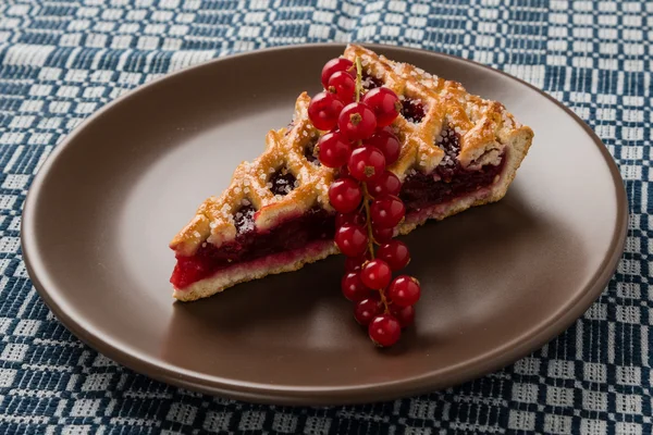 Cherry pie on brown plate — Stock Fotó