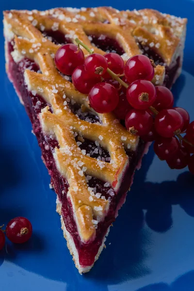 Cherry pie on blue plate — Stock Fotó