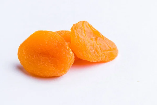 Getrockneter Pfirsich auf weißem Tisch — Stockfoto
