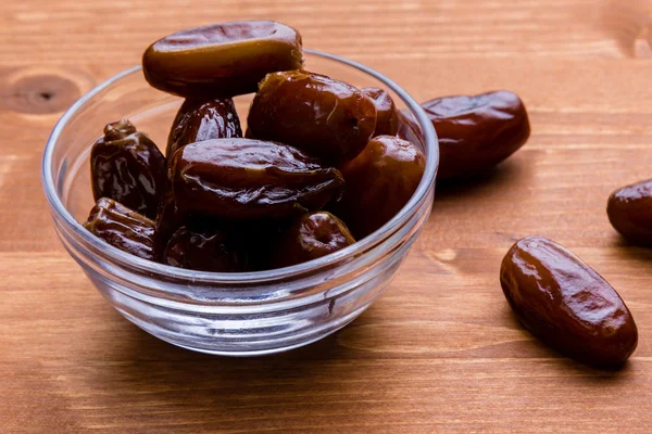 Dried dates on wooden table — Stock Photo, Image