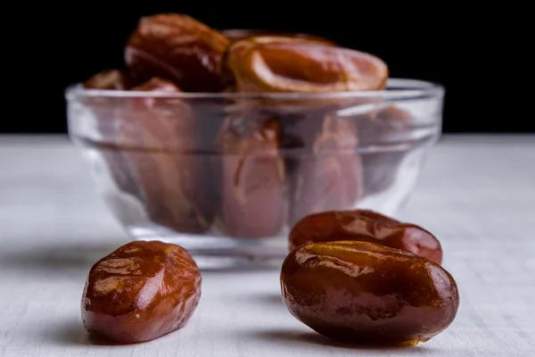 Dried dates on white table — Stock Photo, Image