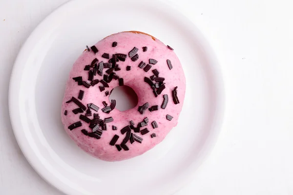 Donut na placa branca — Fotografia de Stock