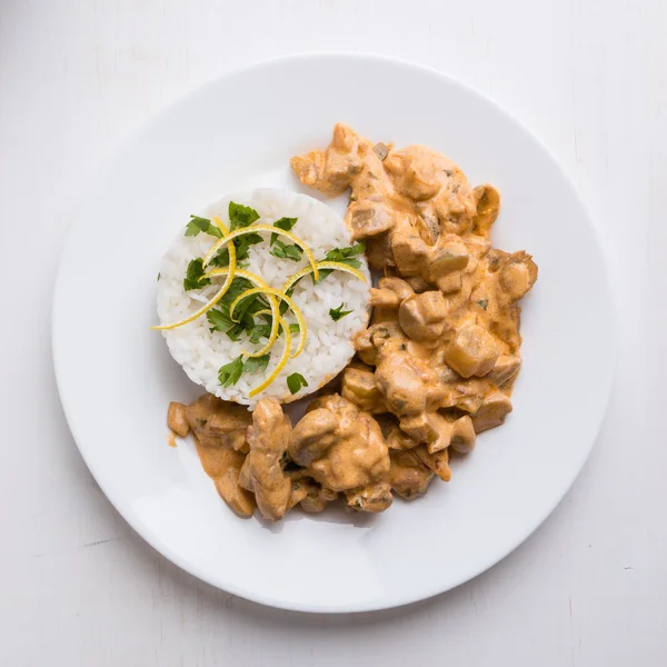 Stroganoff met rijst Stockfoto