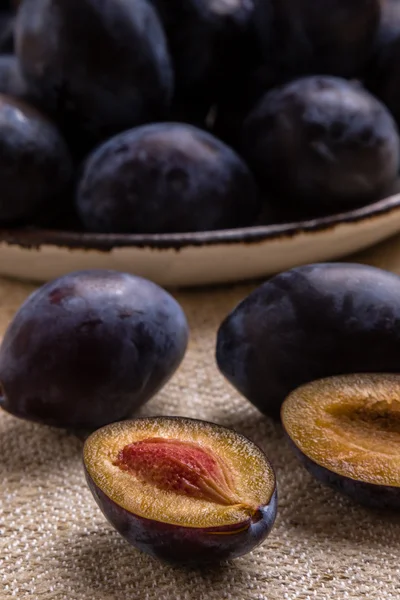 Fresh healthy plums on table — Stock Photo, Image