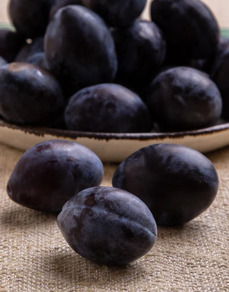 Fresh healthy plums on table — Stock Photo, Image