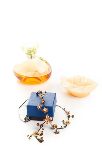 Necklace perfume and candle — Stock Photo, Image