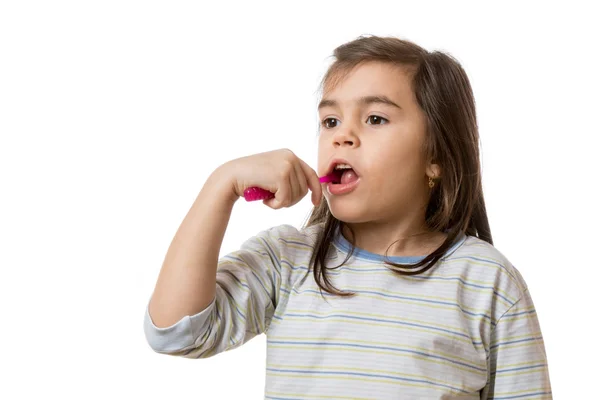 Girl brushing teeth — Stock Photo, Image