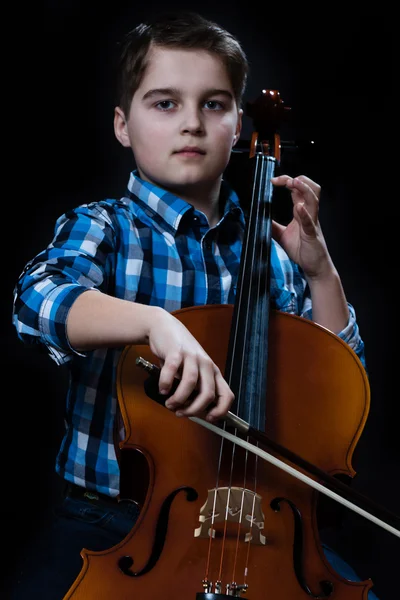 Young Cellist playing classical music on cello — Stock Photo, Image