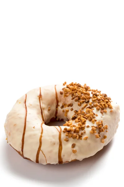 Donut na mesa branca — Fotografia de Stock