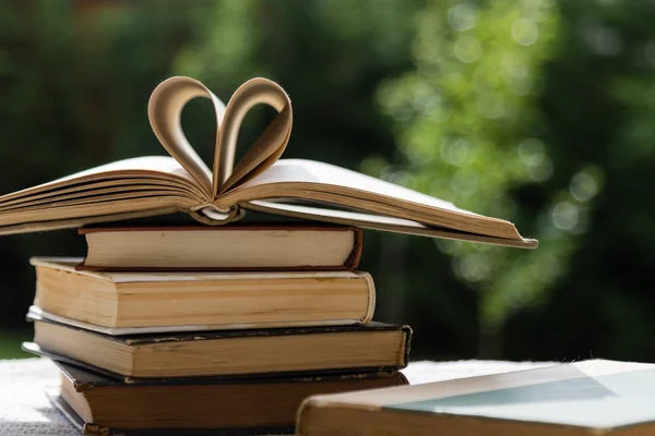 Stack of books with heart shape — Stock Photo, Image