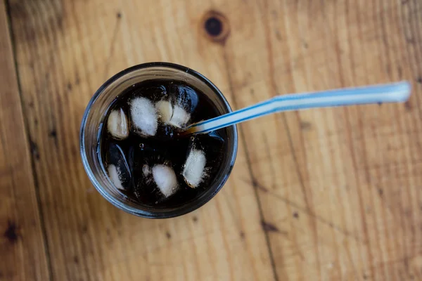 Soda whit ice and straw — Stok fotoğraf