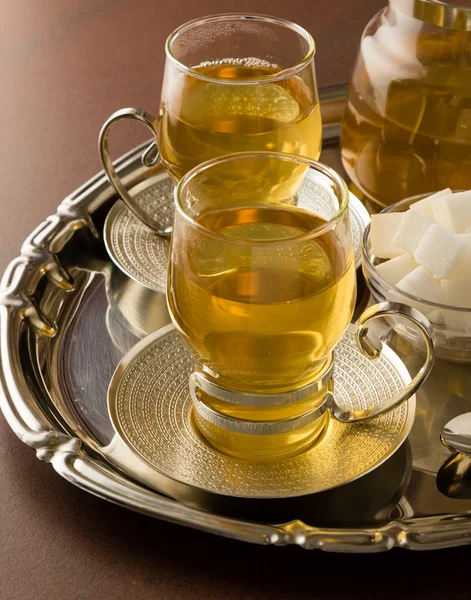 Čaj v stylové skleněné hrnek — Stock fotografie