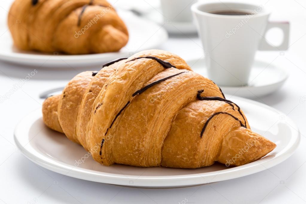 fresh croissant and coffee