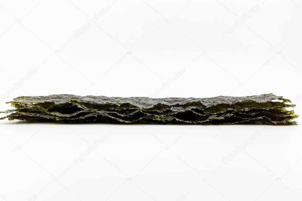 Seaweed often eaten in Asia. Seaweed roasted in oil. Side dishes